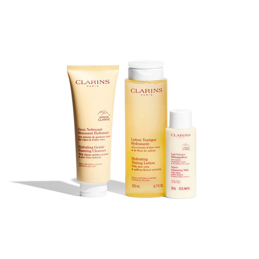 Clarins Conjunto de limpeza essencial para pele normal a seca, com 4 peças.